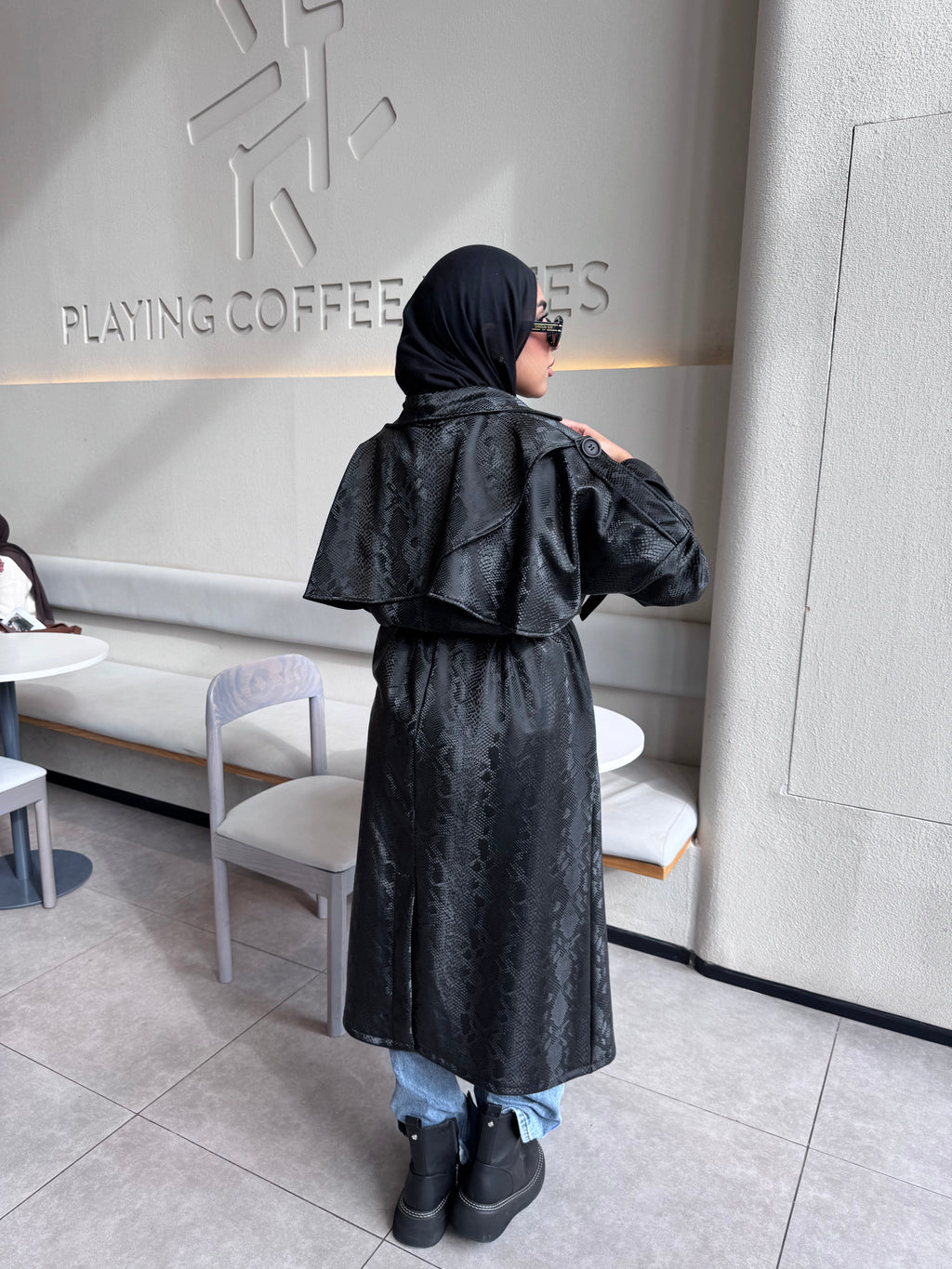 Snake trench coat
