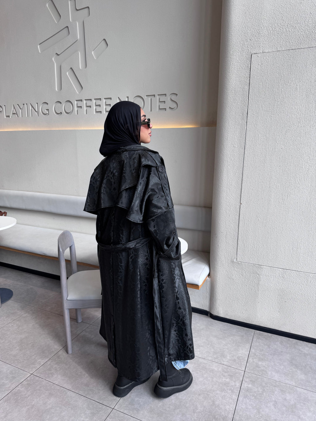 Snake trench coat