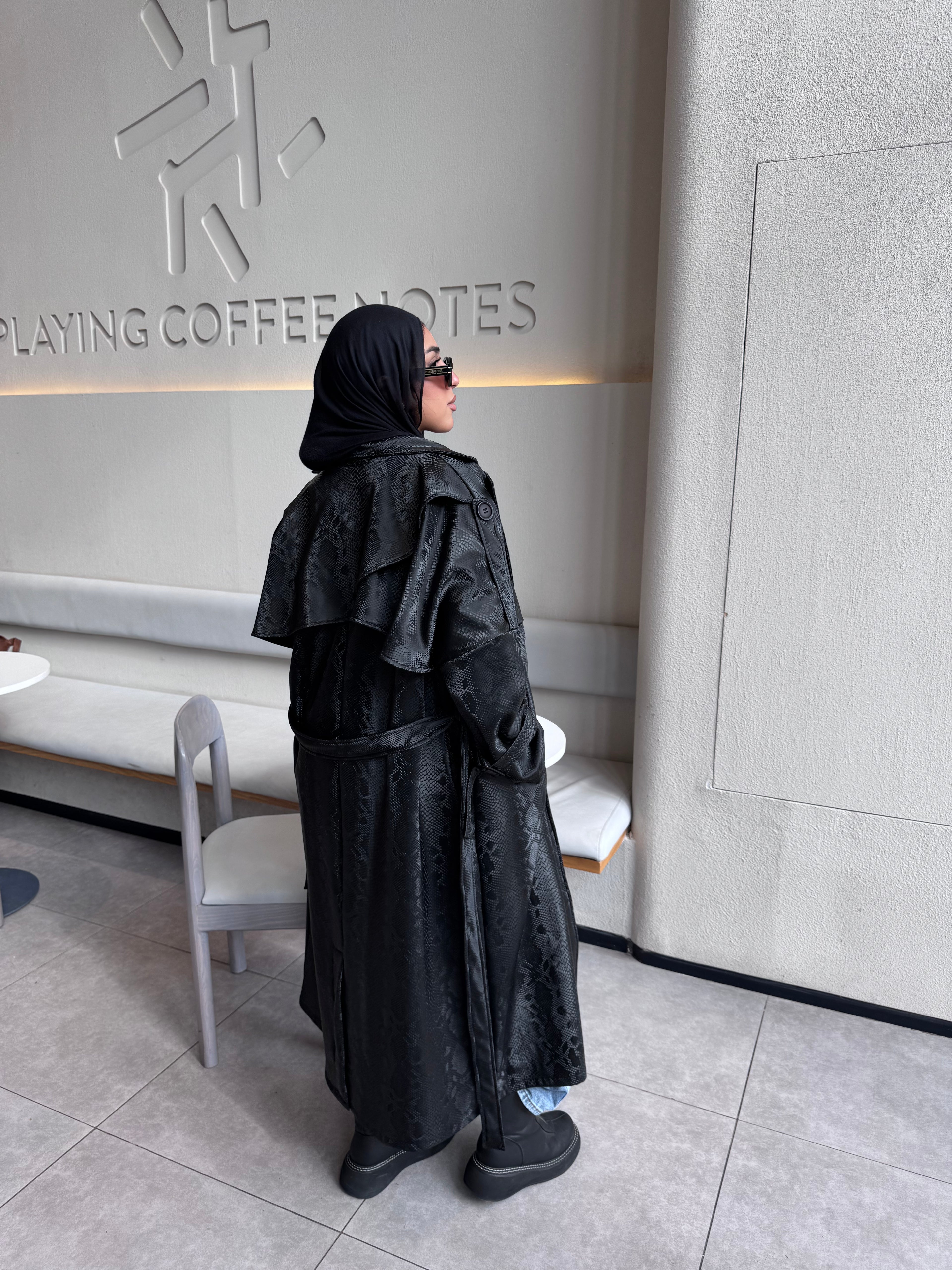 Snake trench coat